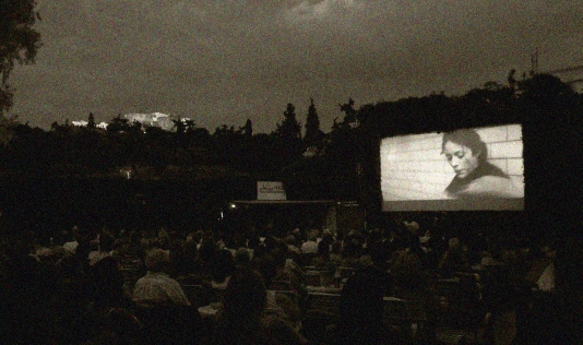 In this July 23, 2014 photo, people watch the movie 